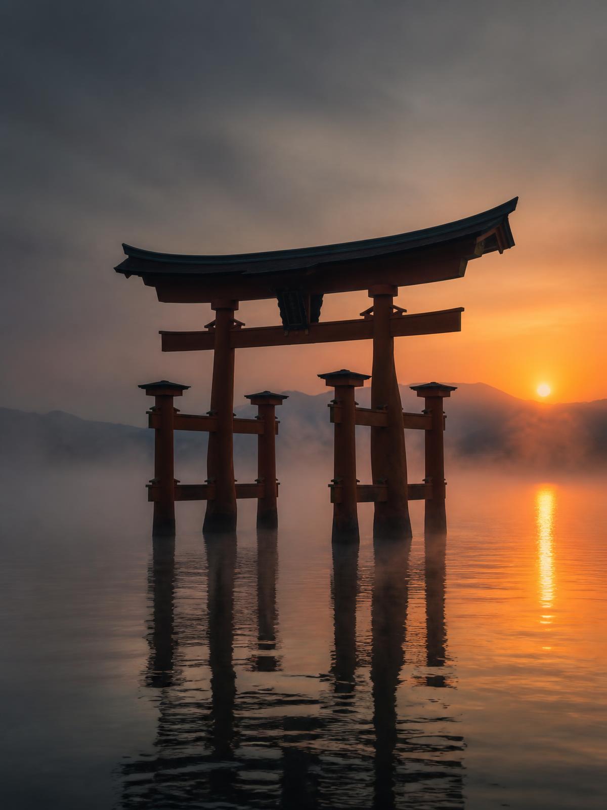 Japanese torii gate at dawn